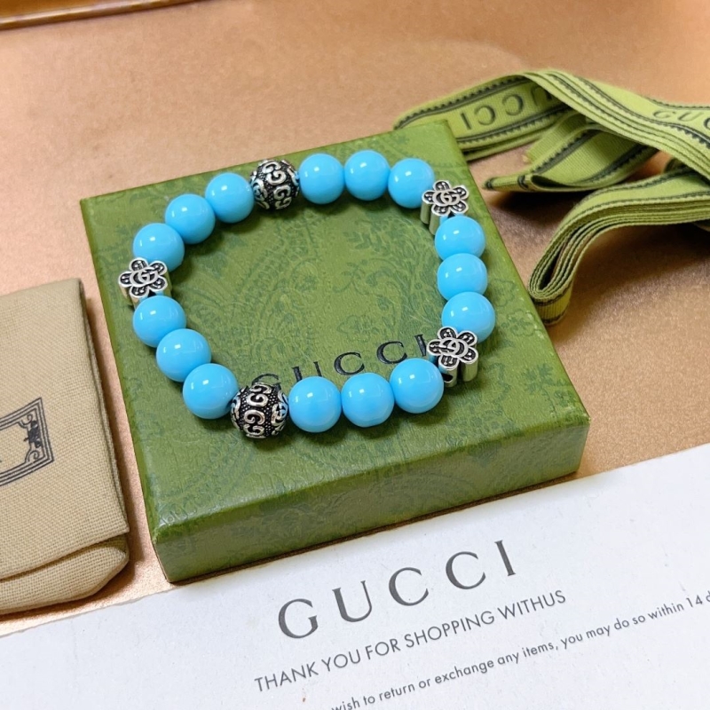 G*u*i bracelets